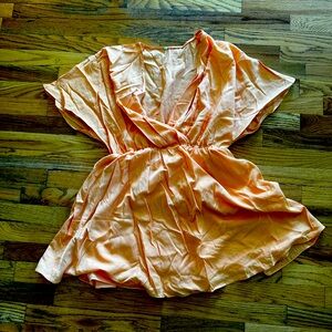 Orange flowy mini dress
